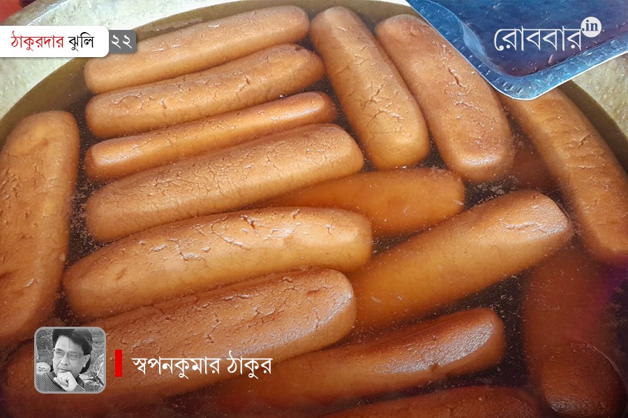 traditional giant sweets of dolyatra fair in east burdwan | Robbar